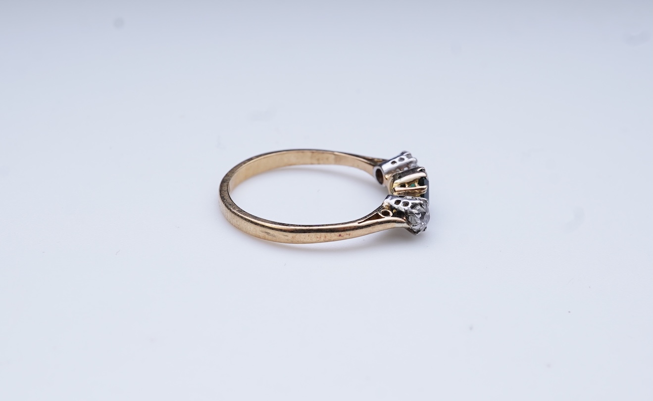A tsavorite and diamond ring